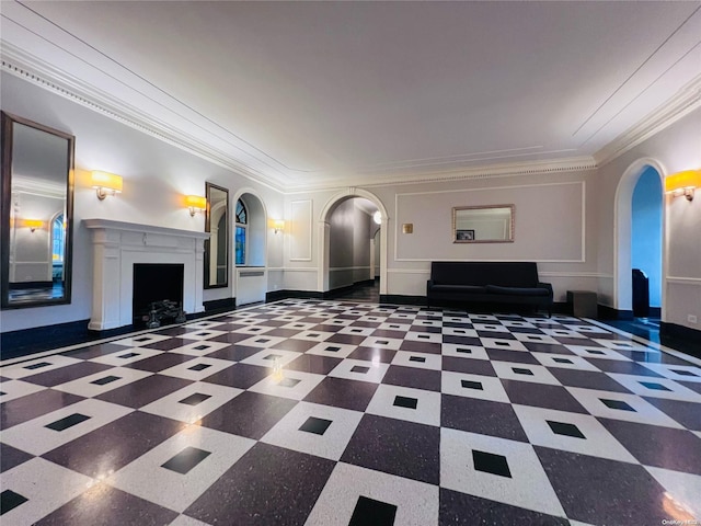 unfurnished living room featuring crown molding