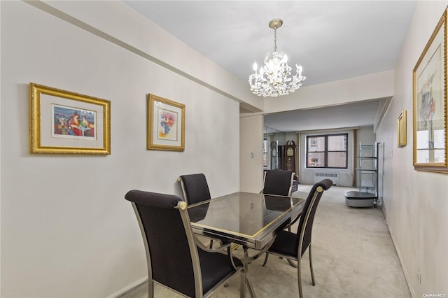 carpeted dining space with radiator and a chandelier