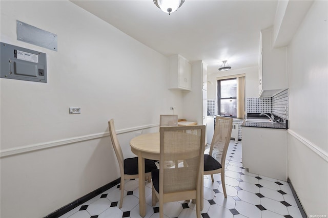 dining space featuring sink