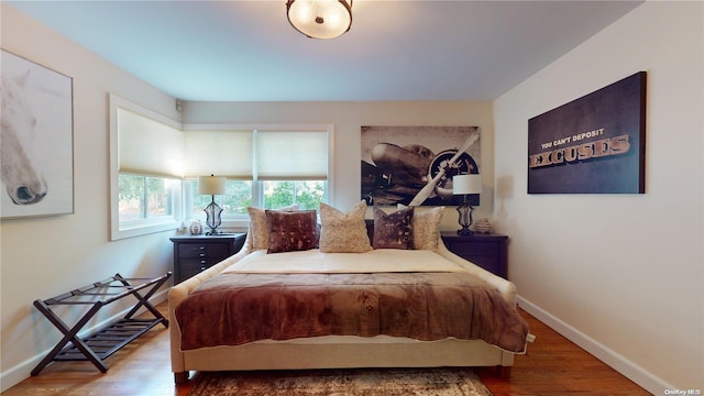 bedroom featuring wood-type flooring