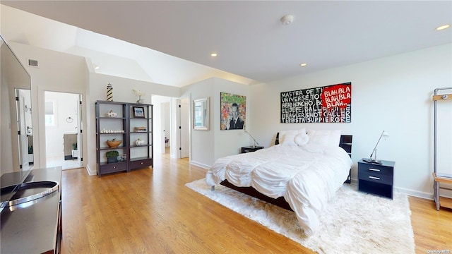 bedroom featuring light hardwood / wood-style flooring