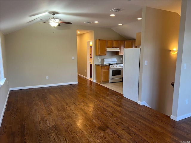 kitchen featuring white appliances, light hardwood / wood-style floors, ceiling fan, and lofted ceiling