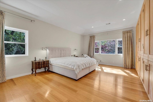 bedroom with light hardwood / wood-style flooring