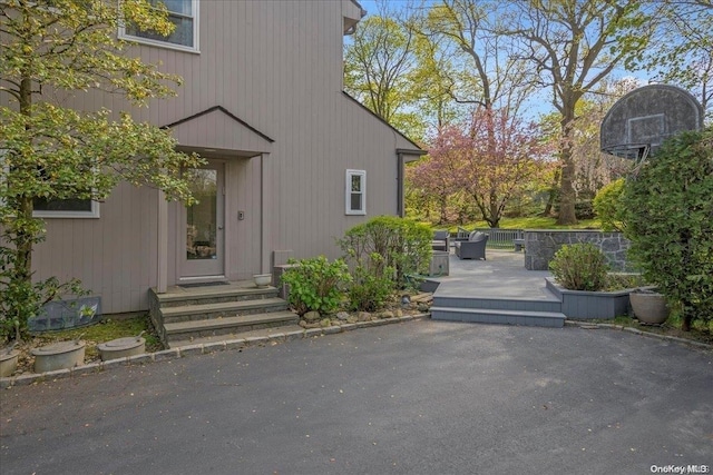 doorway to property with a patio