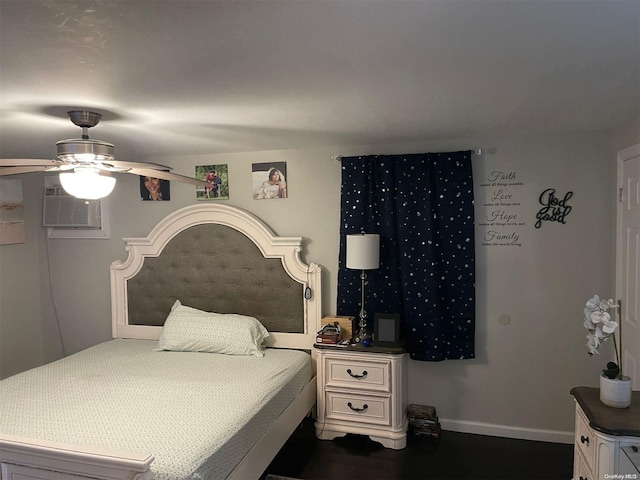 bedroom featuring ceiling fan, dark wood-type flooring, and a wall unit AC