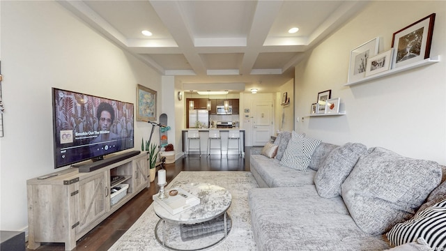 living room with beamed ceiling, dark hardwood / wood-style flooring, and coffered ceiling