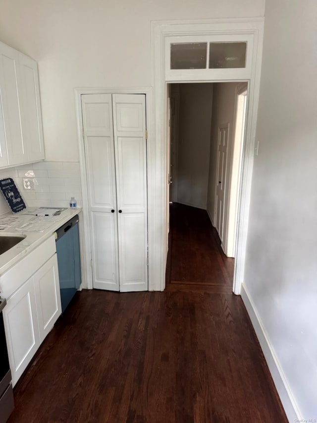 336 74th St, Brooklyn, NY 11209 - kitchen featuring dark wood-type flooring, dishwashing machine, white cabinets, decorative backsplash, and light stone counters