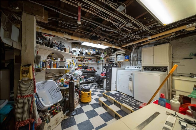 basement featuring washing machine and clothes dryer