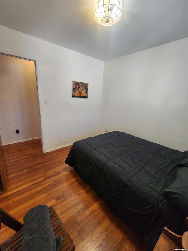 bedroom featuring hardwood / wood-style flooring