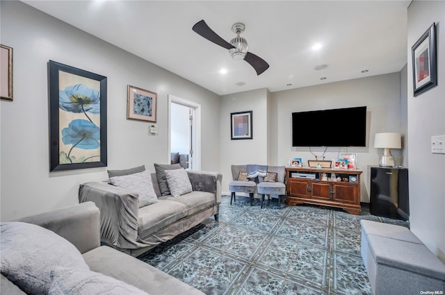 living room with tile patterned flooring and ceiling fan