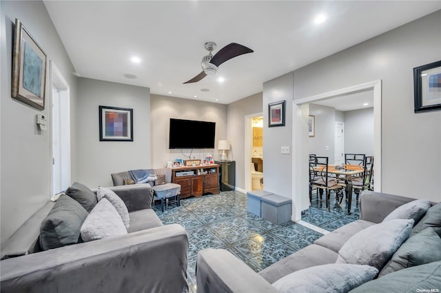 living room featuring ceiling fan