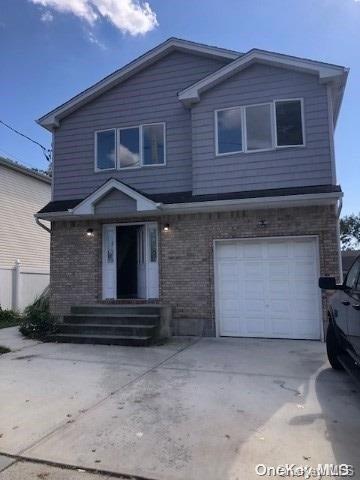 view of property with a garage