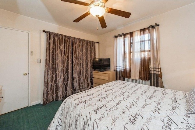 carpeted bedroom featuring ceiling fan