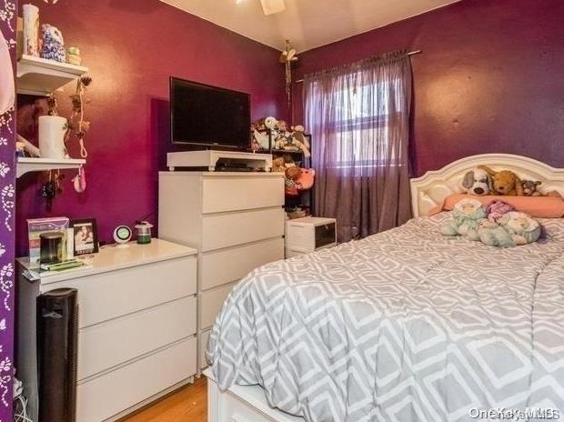 bedroom with light hardwood / wood-style flooring