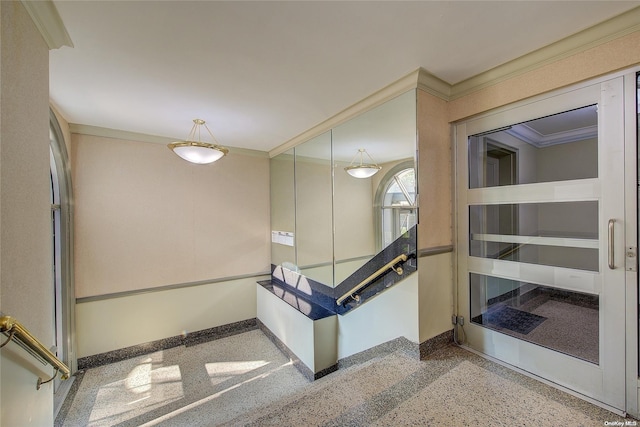 stairway with crown molding