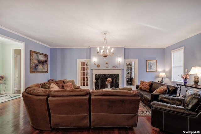 living room with crown molding, a fireplace, and dark hardwood / wood-style flooring