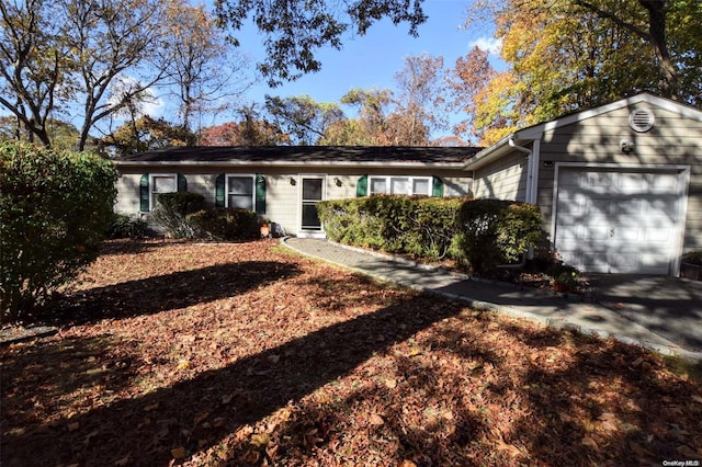 ranch-style house with a garage