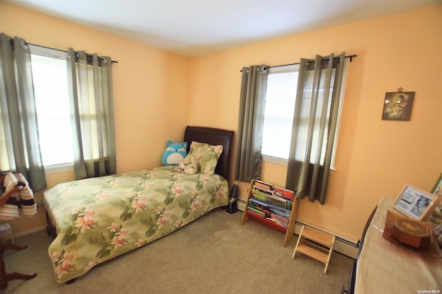 carpeted bedroom with multiple windows