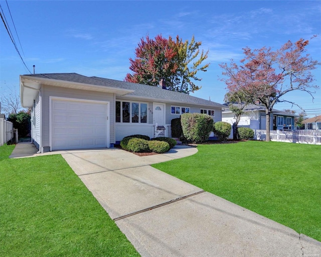 single story home with a front lawn and a garage