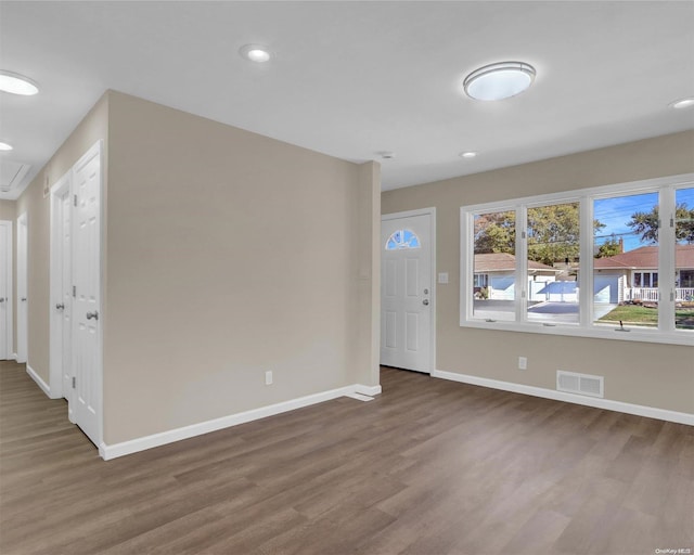 foyer entrance featuring hardwood / wood-style floors