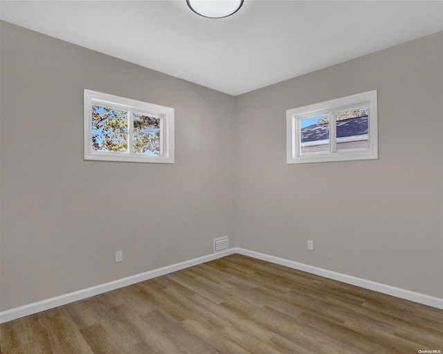 empty room with light wood-type flooring