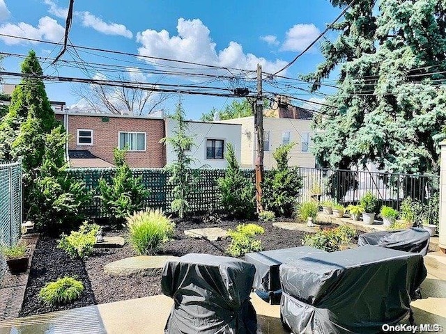 25-54 37th St, Astoria, NY 11103 - fenced backyard with a vegetable garden