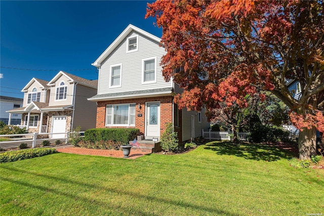 view of front of house featuring a front yard