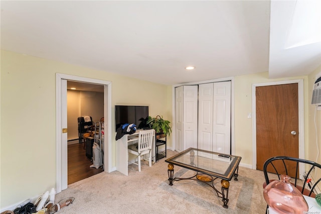 sitting room with light colored carpet