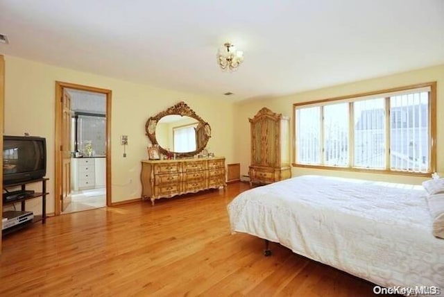 bedroom with wood-type flooring