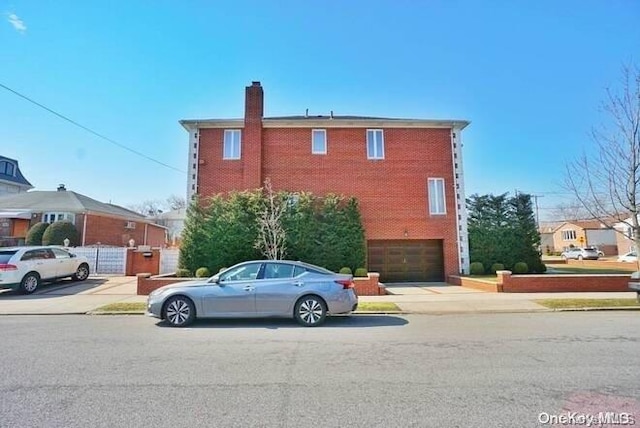 exterior space with a garage