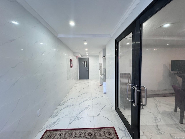 hallway featuring french doors, elevator, and crown molding