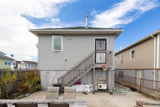 back of property featuring a patio