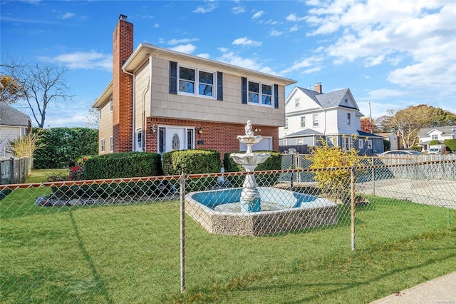 view of front of house featuring a front lawn