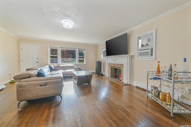 living room with wood-type flooring, a brick fireplace, cooling unit, and crown molding