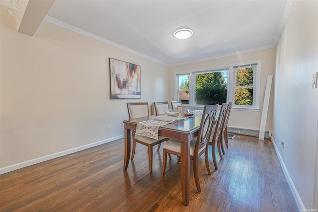 dining area with dark hardwood / wood-style floors and crown molding