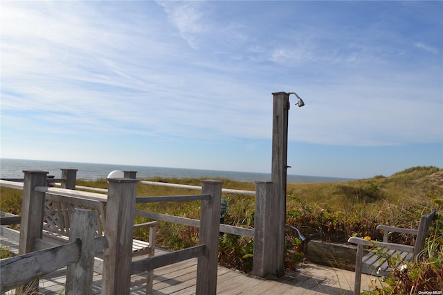 deck featuring a water view