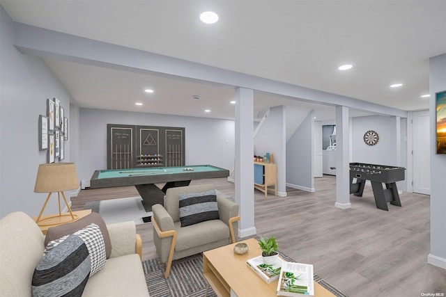 recreation room with hardwood / wood-style flooring, washer / clothes dryer, and pool table