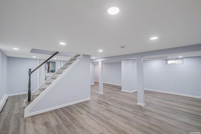 basement with light wood-type flooring