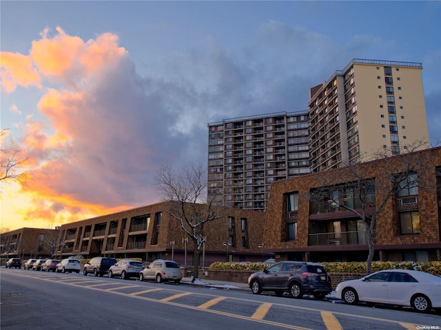 view of outdoor building at dusk