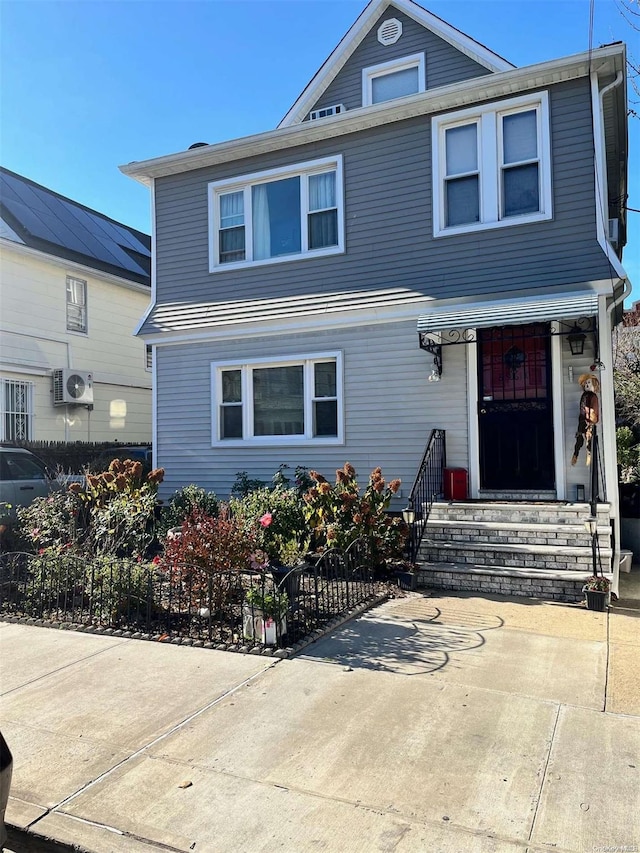 front of property with ac unit