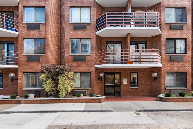 119-40 Metropolitan Ave Unit G2, Kew Gardens, NY 11415 - view of apartment building / complex featuring central AC unit