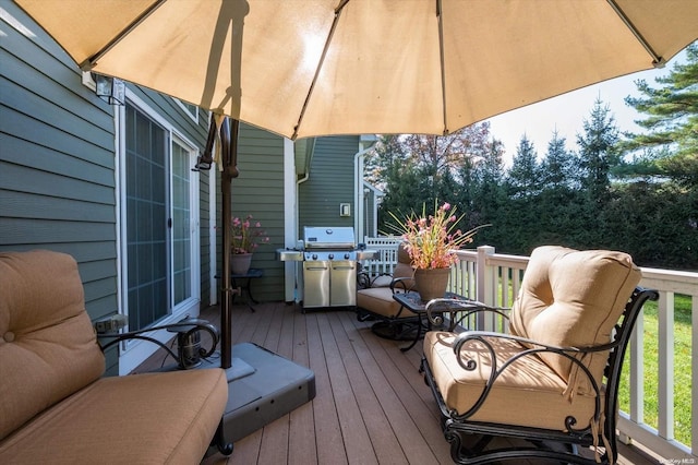 wooden terrace featuring area for grilling