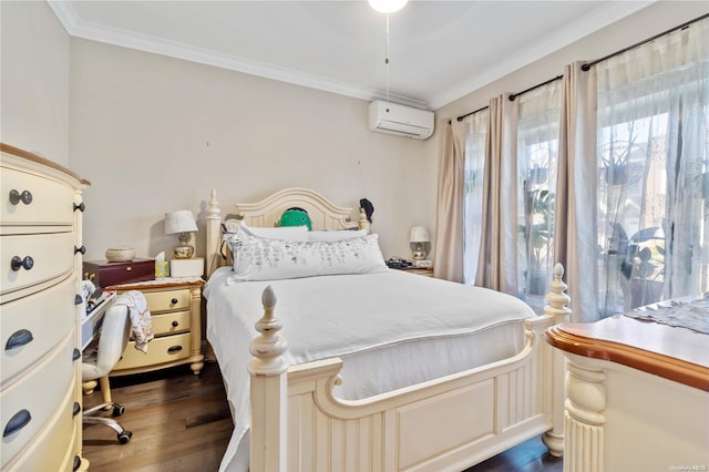 bedroom with dark hardwood / wood-style floors, crown molding, and a wall mounted AC