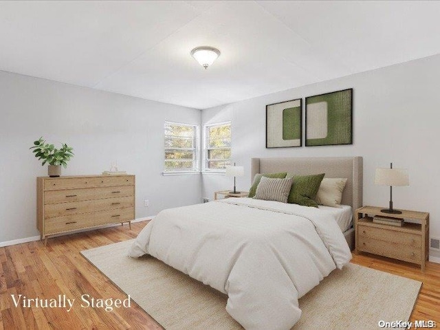 bedroom featuring light hardwood / wood-style flooring