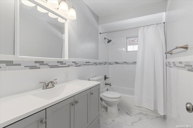 full bathroom featuring tile walls, vanity, shower / tub combo, and toilet