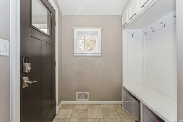 mudroom featuring light tile patterned flooring