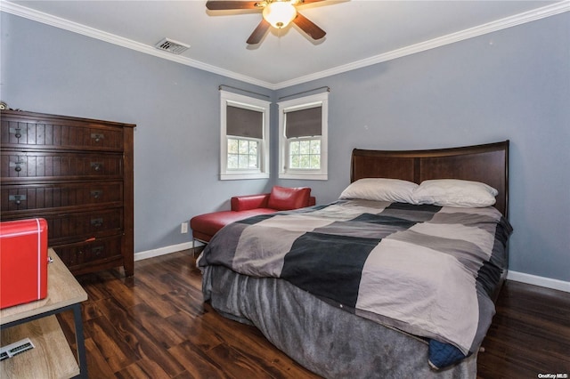 bedroom featuring ceiling fan, ornamental molding, and dark wood-type flooring