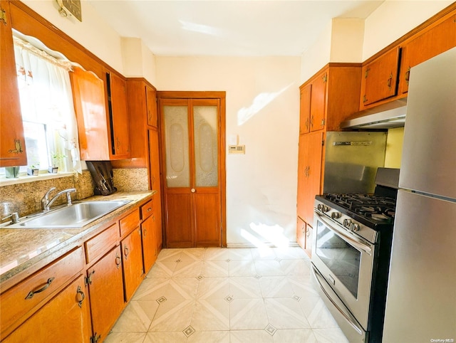 kitchen featuring appliances with stainless steel finishes and sink