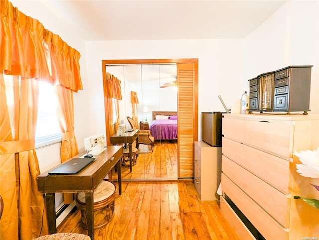 interior space featuring light hardwood / wood-style floors and a baseboard radiator