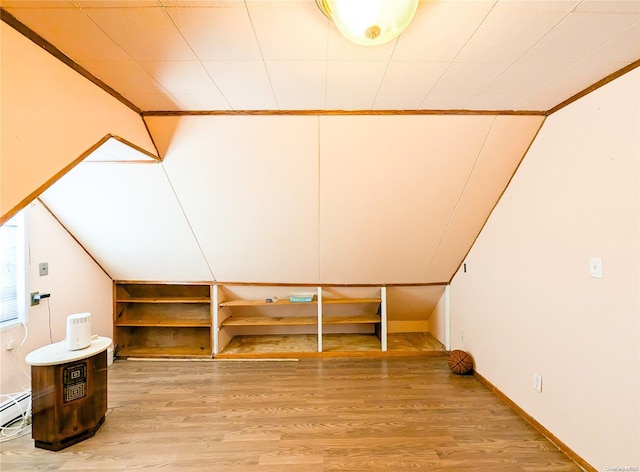 bonus room featuring hardwood / wood-style floors